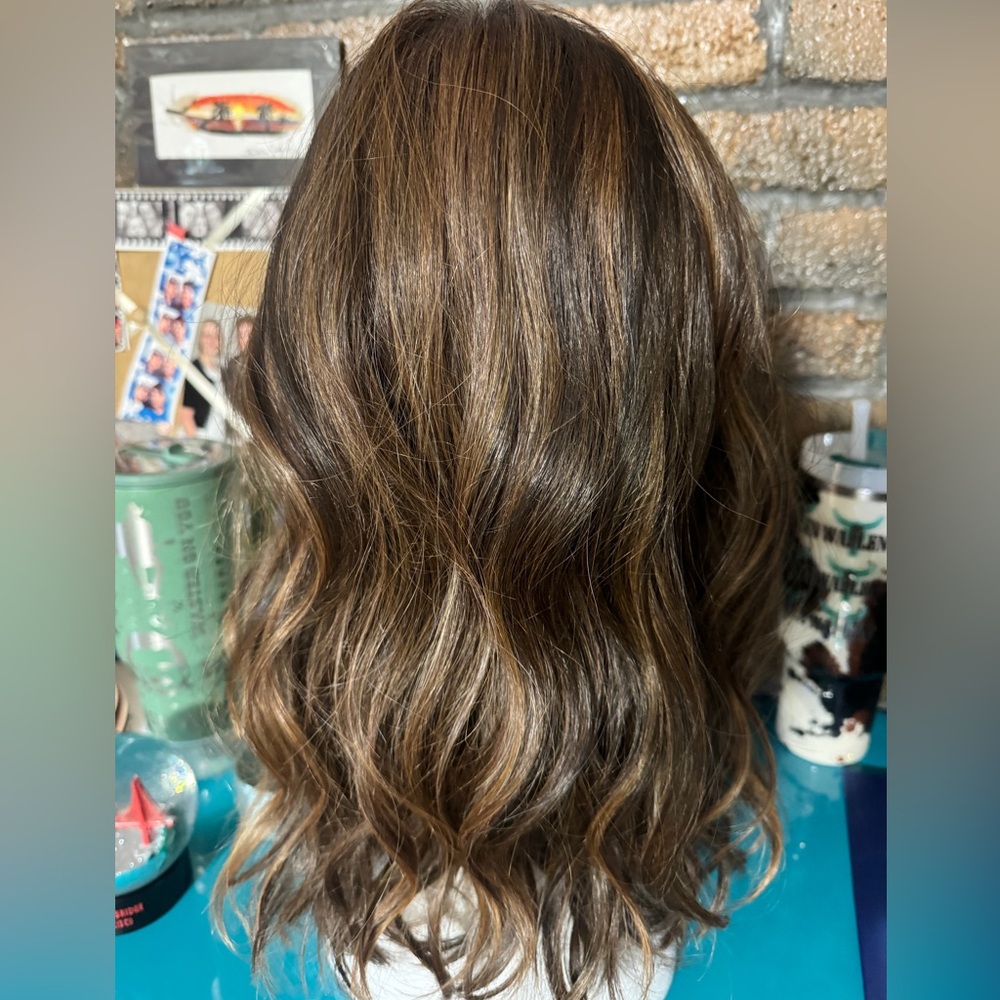 Brand new synthetic lace wig. Only tried on. Never worn